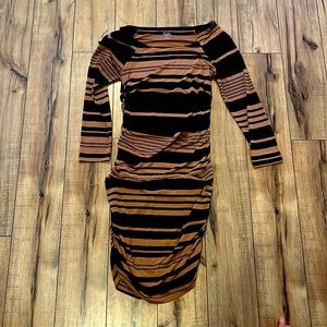 Sofia black and brown-striped bodycon dress.